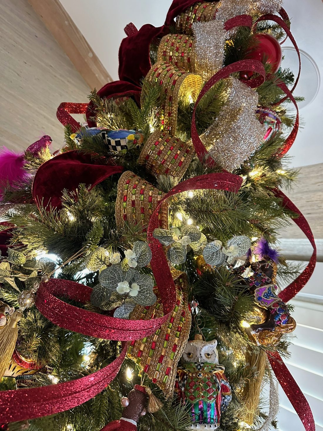 Burgundy ribbon and gold ornaments