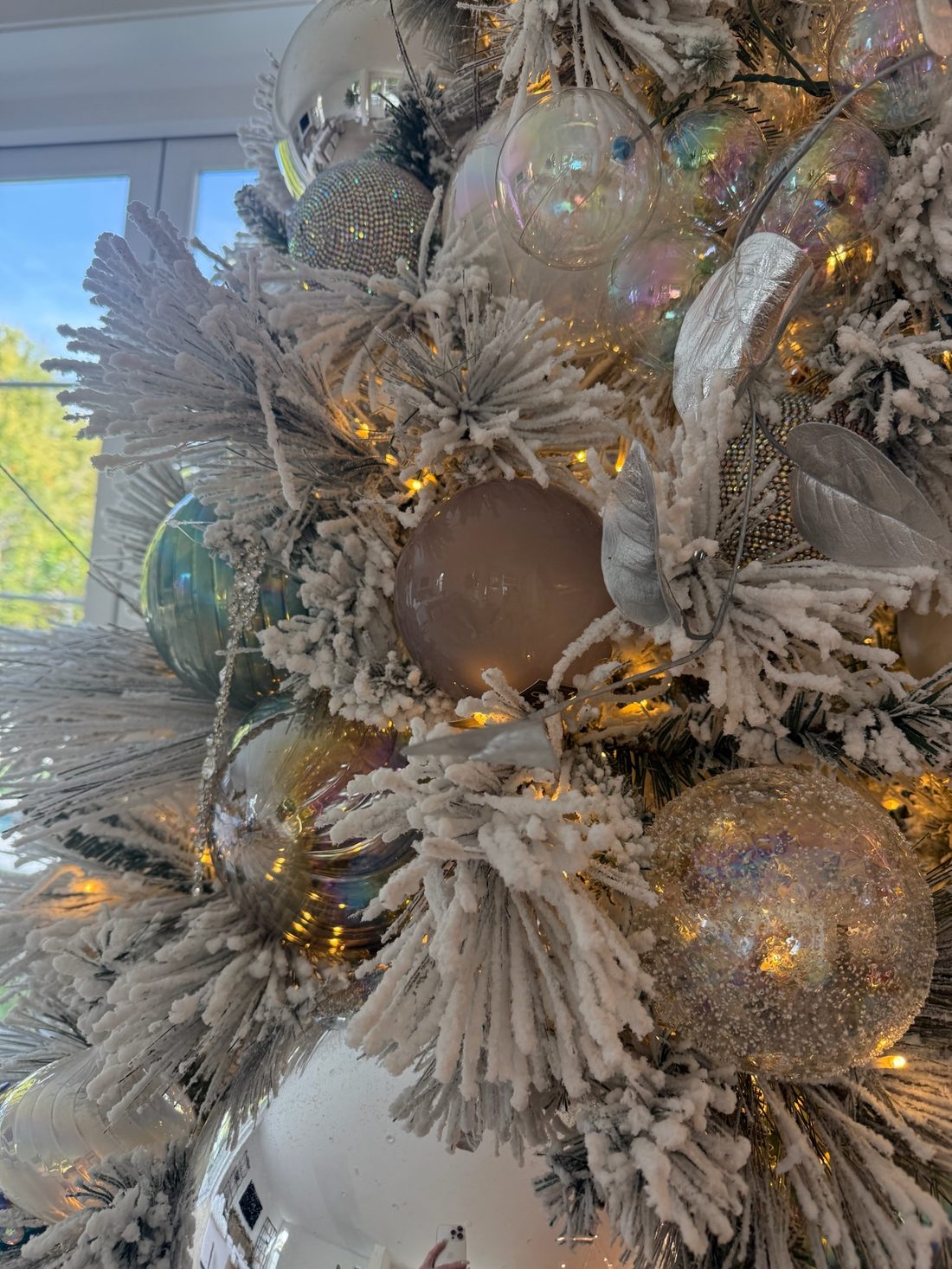 Frosted tree with gold and cream ornaments